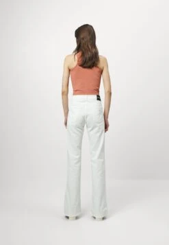 Emporio Armani Flared Jeans - Flared Jeans -Total Wear Store c1230f68ab7446009c95c34d6e7e7821