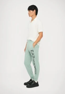EA7 Emporio Armani TRAIN LOGO SERIES PANTS - Tracksuit Bottoms - Blue Surf -Total Wear Store cba6af78a34c463eb6d6cb041ed070a5