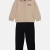 EA7 Emporio Armani UNISEX - Tracksuit - Beige/black -Total Wear Store d9c352c69dad48a58b4db0e172c02503 1