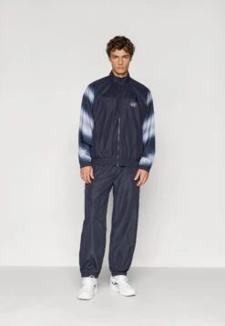 EA7 Emporio Armani TENNIS PRO TRACKSUIT GRAPHIC SET - Tracksuit - Armani Blue