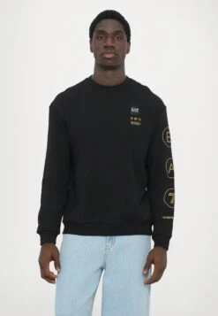 EA7 Emporio Armani TRAIN LOGO UNISEX - Sweatshirt - Black/gold Coloured -Total Wear Store de4c7e85c0ac45a188a0b2b6ca344dd6