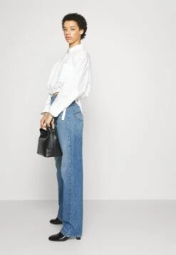 Emporio Armani Bootcut Jeans - Blue Denim -Total Wear Store e1b8a2437c9d4500a8371e7b4d93118c