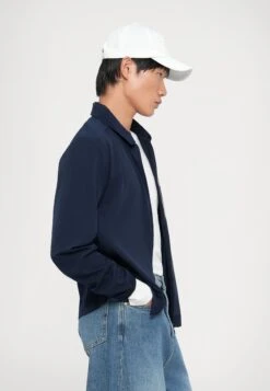 EA7 Emporio Armani GOLF PRO - Summer Jacket - Armani Blue -Total Wear Store e38a411070284fff9a65bd6cfd763c1c