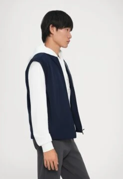 EA7 Emporio Armani GOLF PRO PADDED - Waistcoat - Blue -Total Wear Store e434a04b820c404ba6a4fd7be3cc28d3