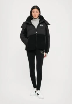 EA7 Emporio Armani Leggings - Trousers - Black/gold-coloured -Total Wear Store ebec50af4b2345ce887c7e86c740762a